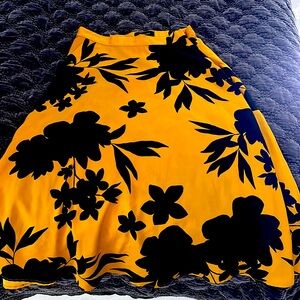 NWOT patterned midi skirt.
